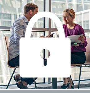 White padlock icon overlaying a photo of a man and woman sitting at a table in an office