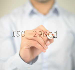 Man writing ISO 27001