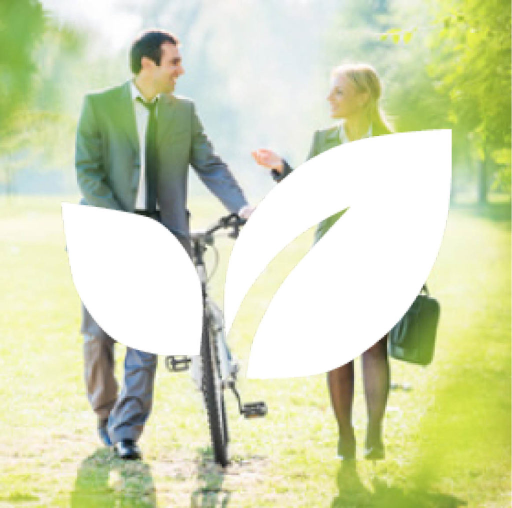 Man walking with a bike talking with a woman