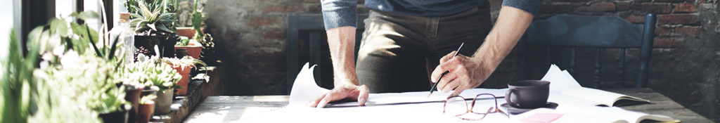 Man working on table in studio